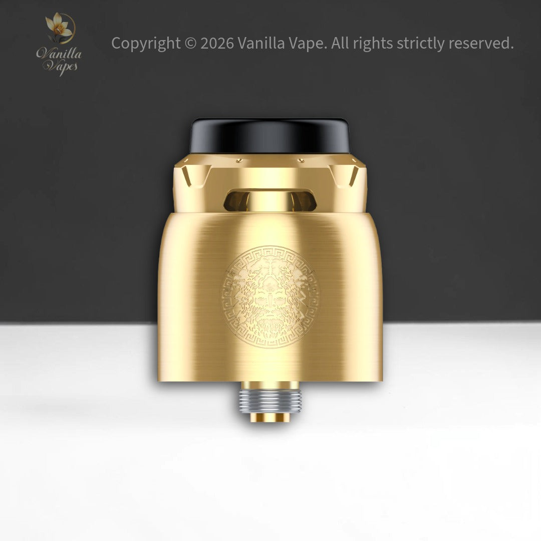 Gold vape device with black top on a white and gray gradient background, Vanilla Vape brand visible.