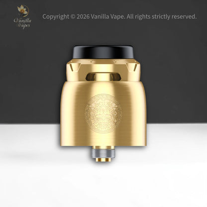 Gold vape device with black top on a white and gray gradient background, Vanilla Vape brand visible.