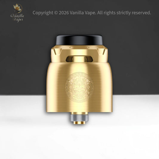 Gold vape device with black top on a white and gray gradient background, Vanilla Vape brand visible.
